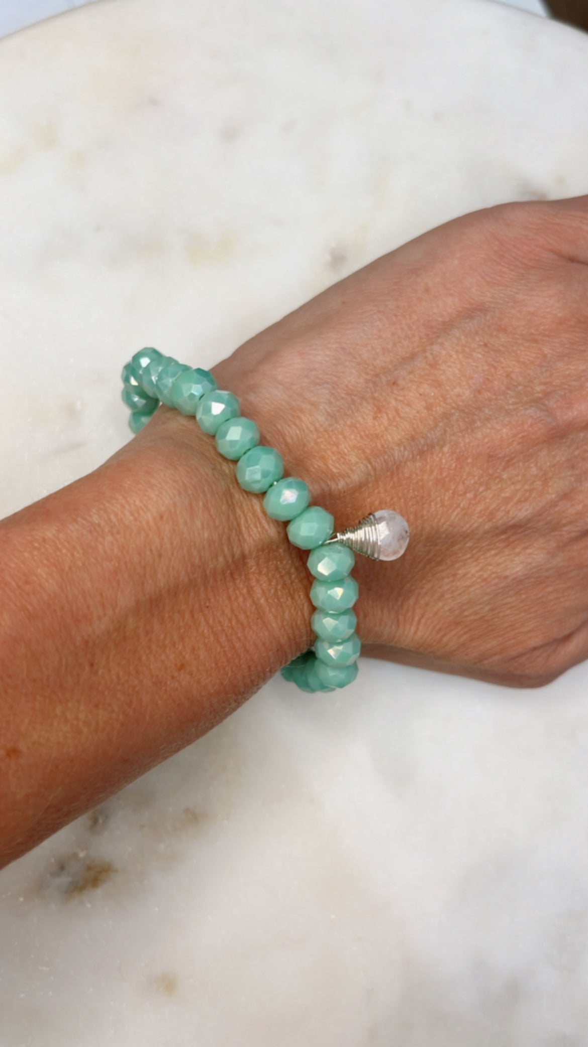 Sea Foam Green Crystal Stretch Bracelet with Moonstone Hand-Wrapped in Sterling Silver.