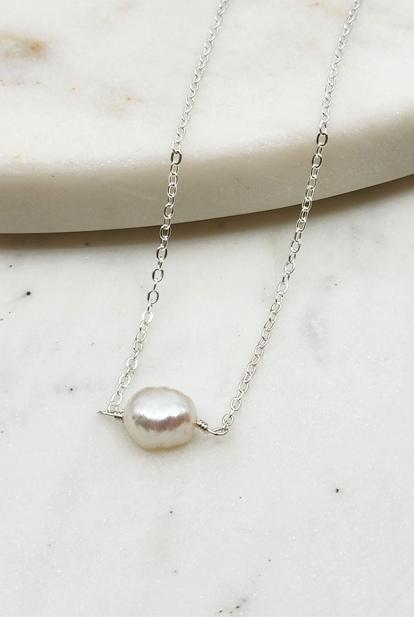 A Simple Pearl Necklace in Silver